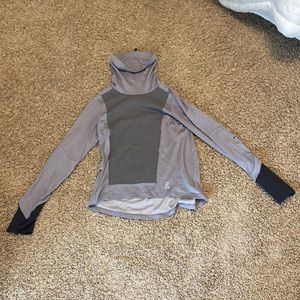 On running grey long sleeve weather shirt